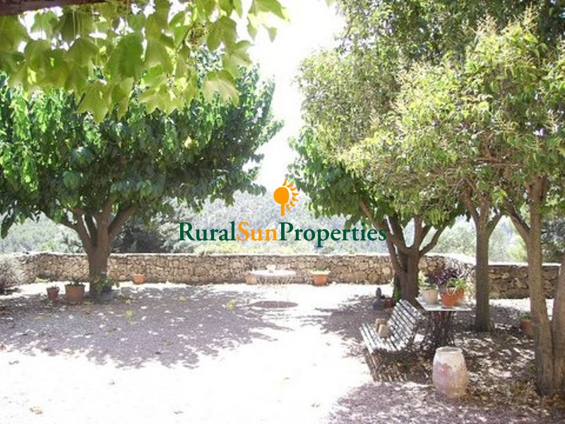 SOLD. Old restored farmhouse Masia on a plot of 5ha Alicante Inland. Olive trees in production