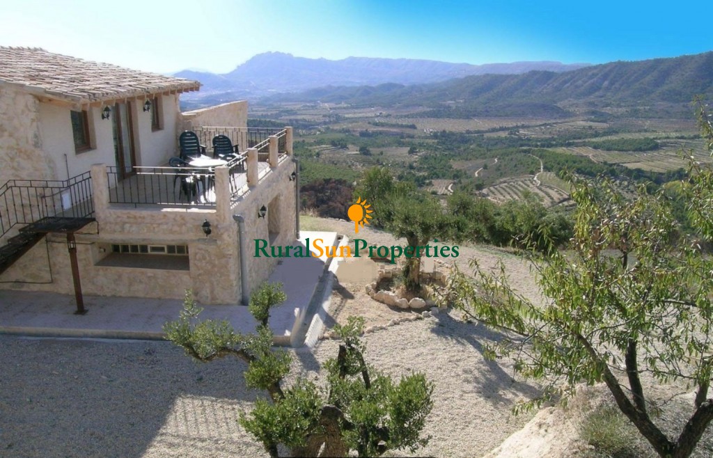 Country House with stunning views over the surrounding valley and mountains.